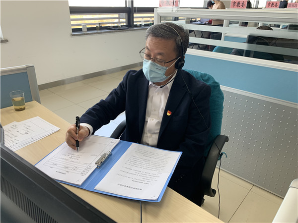 刘宇辉主任带队参加北京市12345热线接听市民电话活动1.jpg